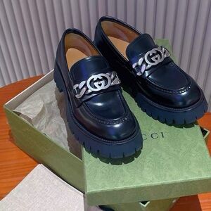 Gucci Black Leather Lug Sole Loafers with Silver GG Chain